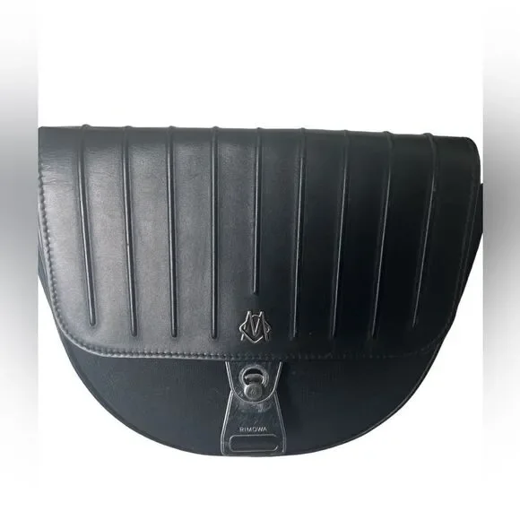 Luxurious “Never Still” Crossbody Saddlebag by Rimowa Exclusive - Picture 4 of 10